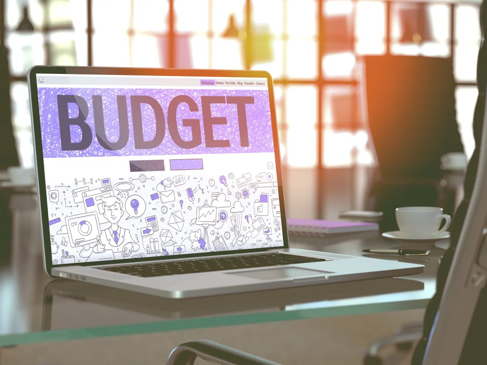 Graphique ou tableau illustrant la préparation d’un Budget publicitaire SEA avec des éléments visuel évoquant l’optimisation des coûts.